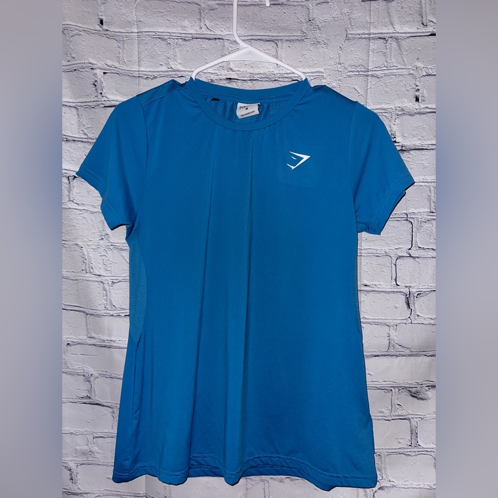 Blue Gymshark workout shirt
